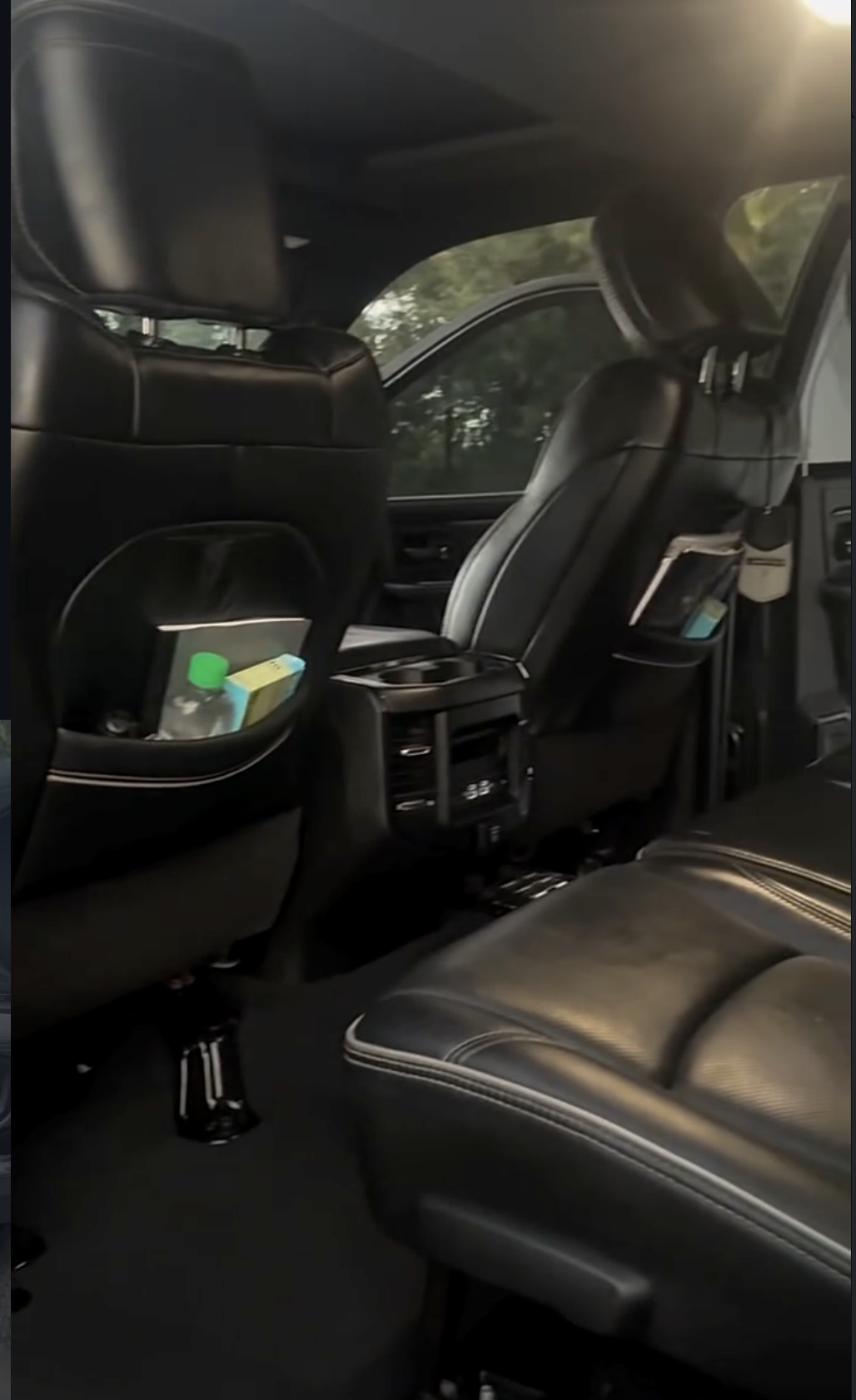 Clean black leather vehicle interior after detailing